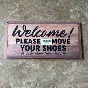 Welcome please remove your shoes thank you sign